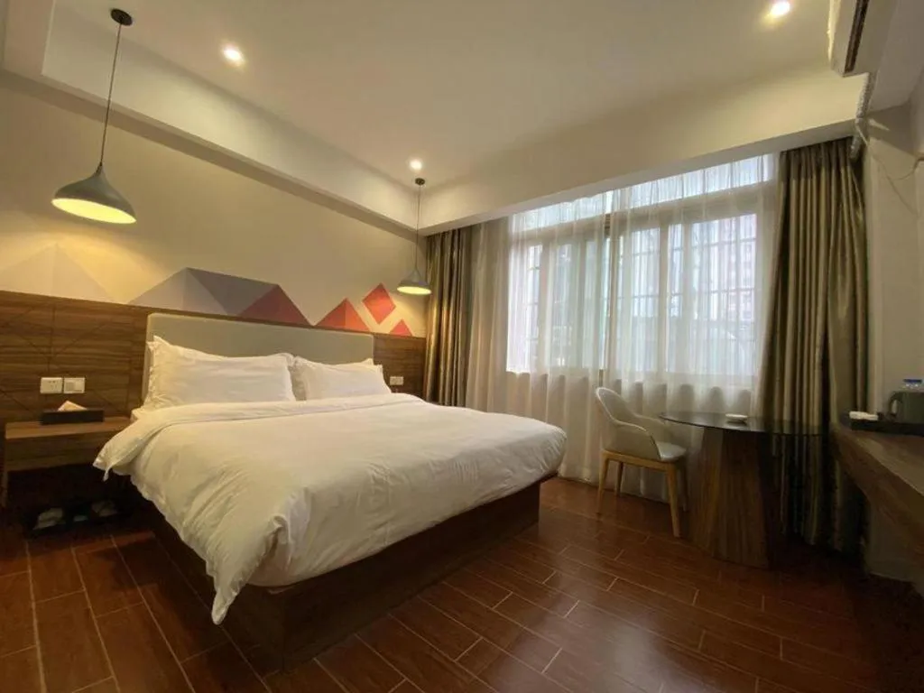 Bed in Borrman Hotel Shaoguan Century East Street Fengcai Building