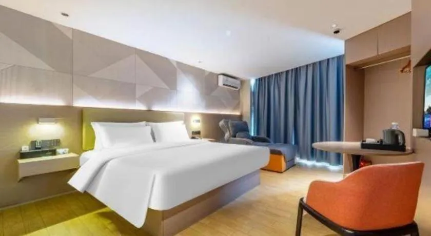 Bed in Borrman Hotel Shaoguan Century East Street Fengcai Building
