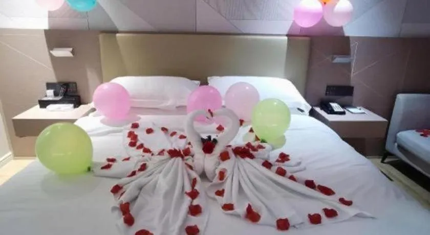 Bed in Borrman Hotel Shaoguan Century East Street Fengcai Building