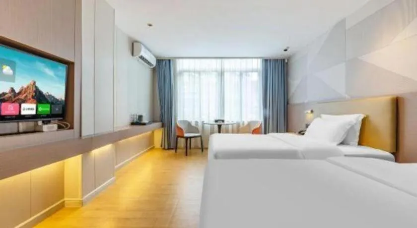 Bed in Borrman Hotel Shaoguan Century East Street Fengcai Building