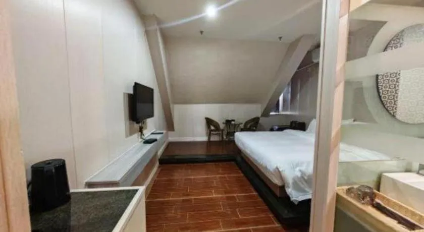 Bed in Borrman Hotel Shaoguan Century East Street Fengcai Building