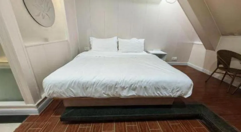 Bed in Borrman Hotel Shaoguan Century East Street Fengcai Building