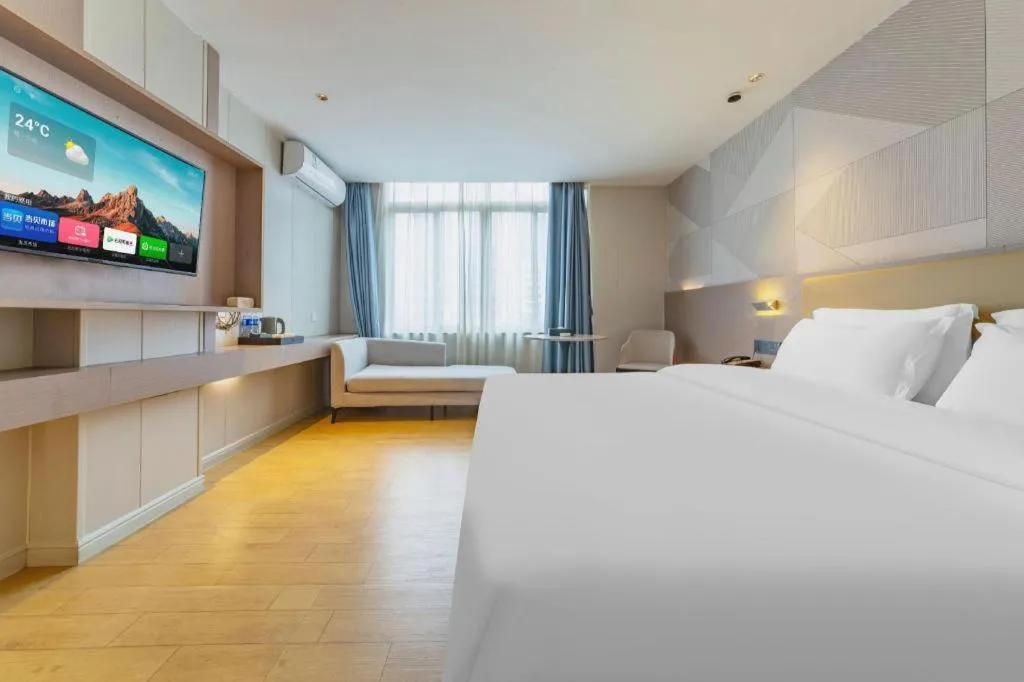 Bed in Borrman Hotel Shaoguan Century East Street Fengcai Building
