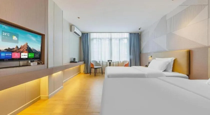 Bed in Borrman Hotel Shaoguan Century East Street Fengcai Building