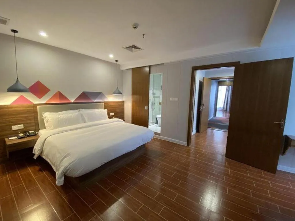 Bed in Borrman Hotel Shaoguan Century East Street Fengcai Building