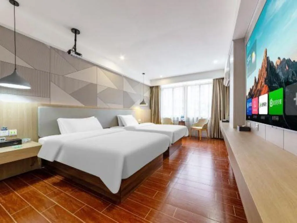 Bed in Borrman Hotel Shaoguan Century East Street Fengcai Building