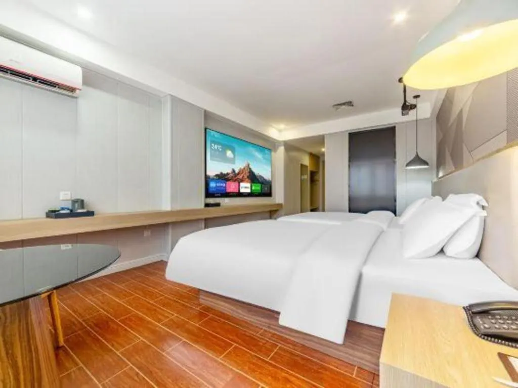 Bed in Borrman Hotel Shaoguan Century East Street Fengcai Building