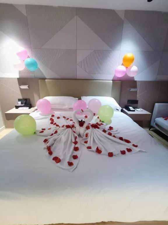 Bed in Borrman Hotel Shaoguan Century East Street Fengcai Building