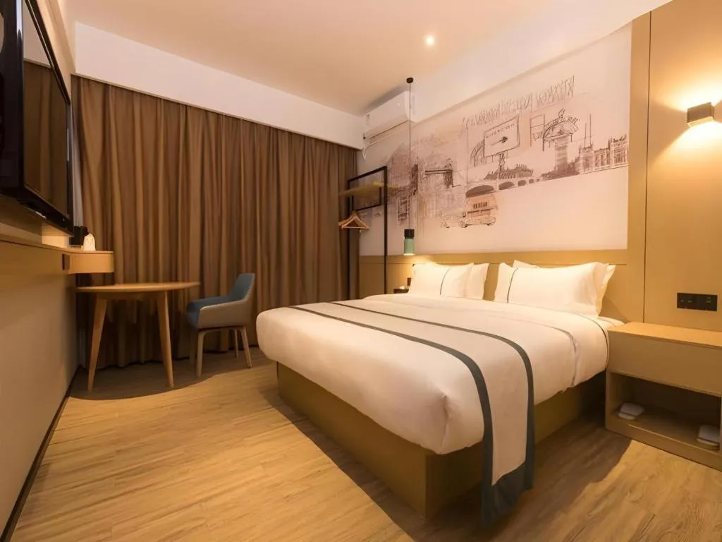 Bed in City Comfort Inn Zhuhai Doumen Daxin Xinduhui Pedestrian Street