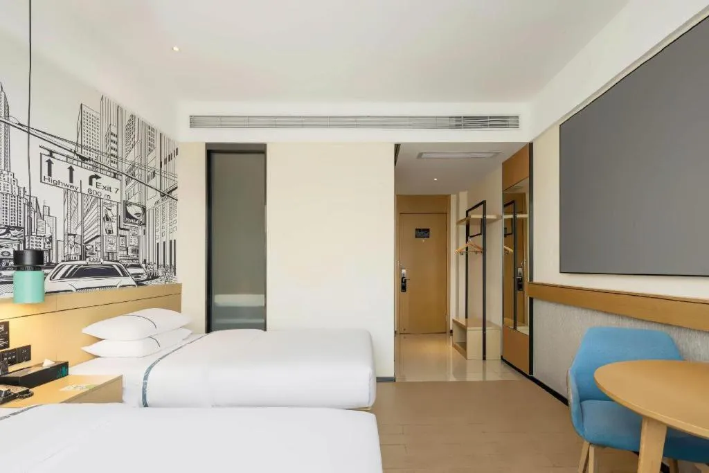 Bed in City Comfort Inn Zhuhai Doumen Daxin Xinduhui Pedestrian Street