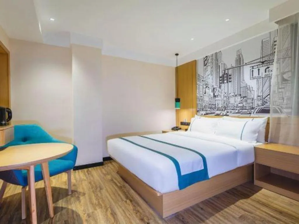 Bed in City Comfort Inn Zhuhai Doumen Daxin Xinduhui Pedestrian Street