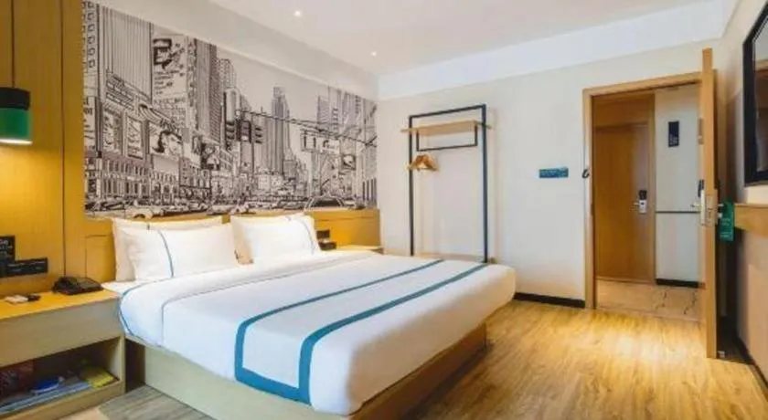 Bed in City Comfort Inn Zhuhai Doumen Daxin Xinduhui Pedestrian Street