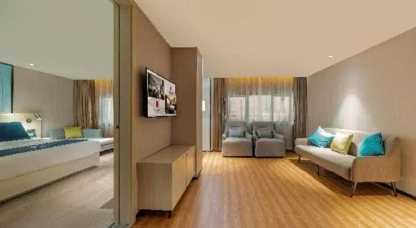 Bed in Echarm Hotel Foshan Jiaokou Metro Station Jiazhou Plaza