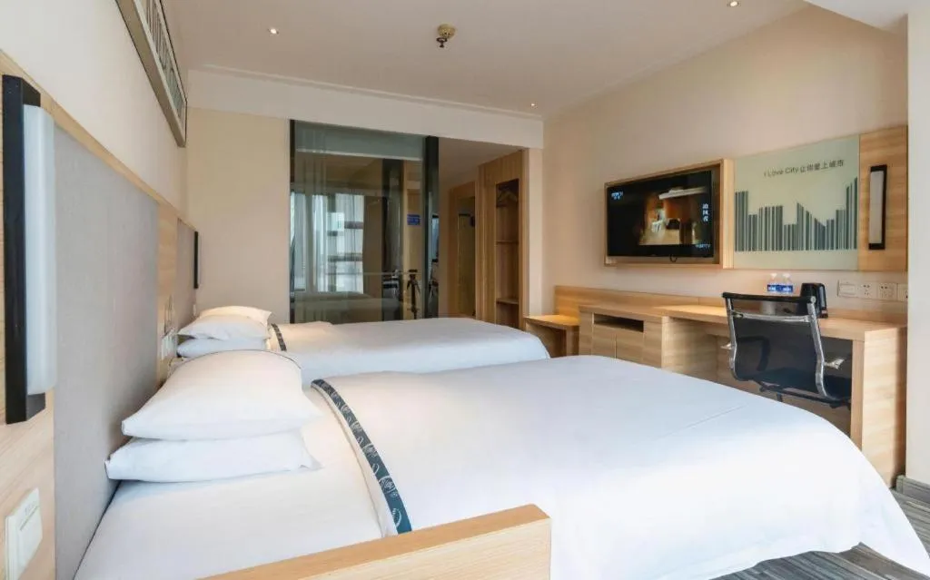 Bed in City Comfort Inn Chengdu Giant Panda Base