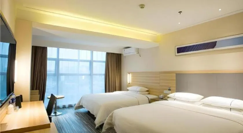 Bed in City Comfort Inn Chengdu Giant Panda Base