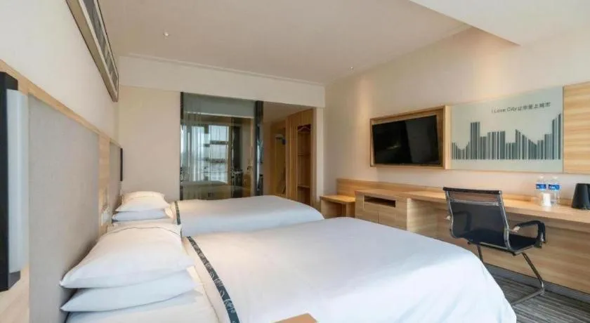 Bed in City Comfort Inn Chengdu Giant Panda Base