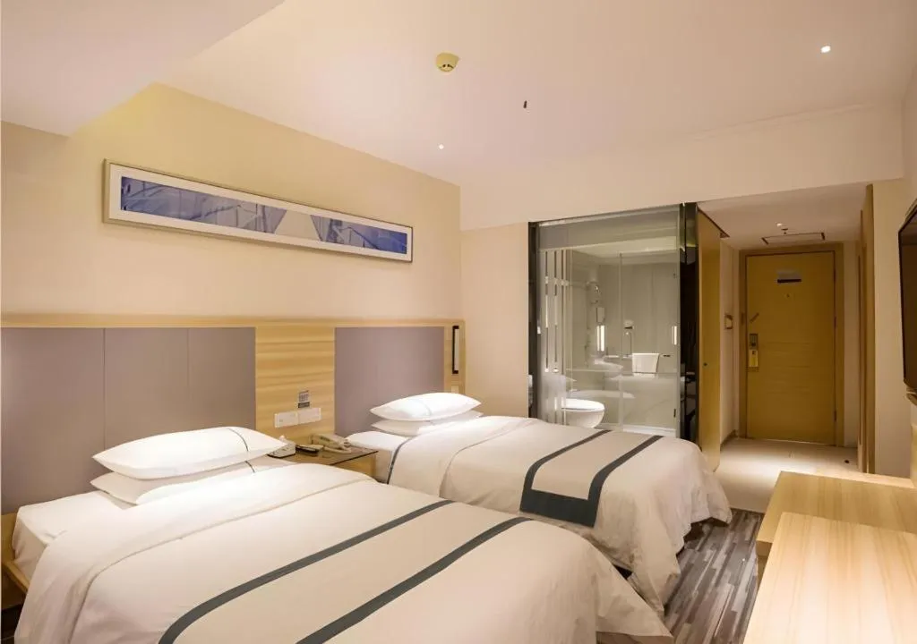 Bed in City Comfort Inn Chengdu Giant Panda Base