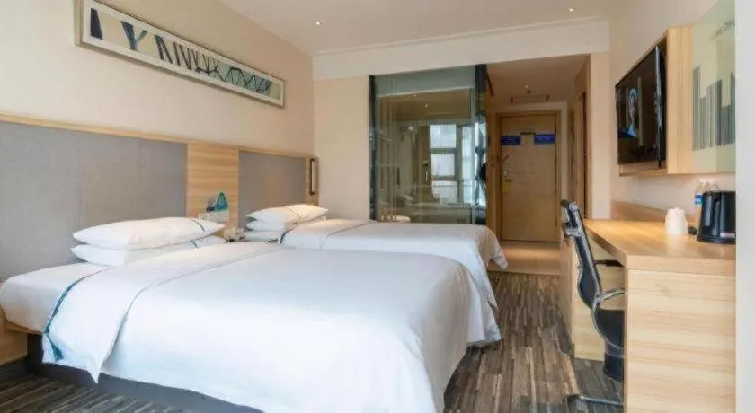 Bed in City Comfort Inn Chengdu Giant Panda Base