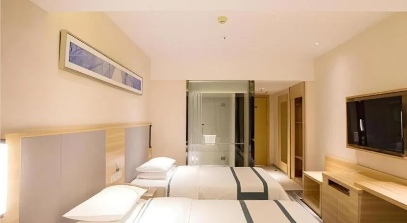 Bed in City Comfort Inn Chengdu Giant Panda Base