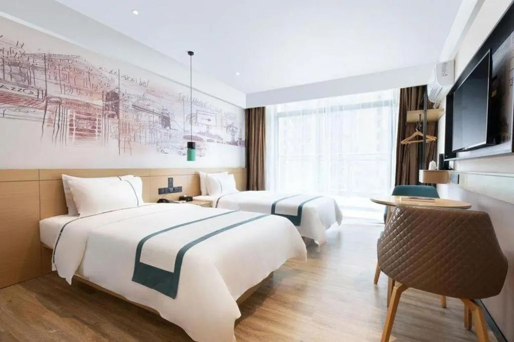 Bed in City Comfort Inn Haikou Xiuying District Wanda Plaza