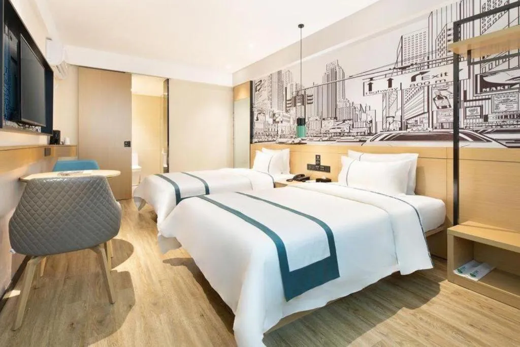 Bed in City Comfort Inn Haikou Xiuying District Wanda Plaza