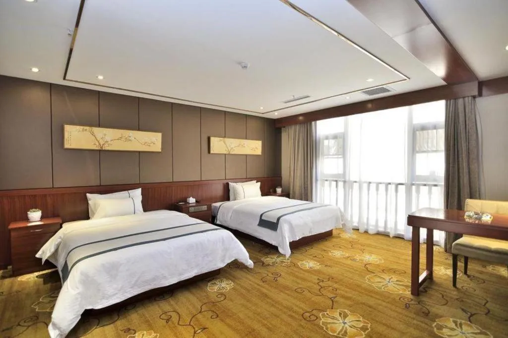 Bed in City Comfort Inn Kunming Xinluojiu Bay Guangju Road