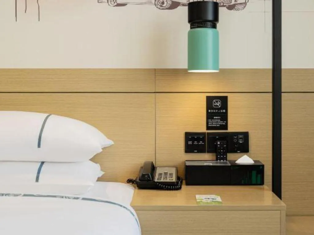 Bed in City Comfort Inn Shaoguan High-speed Railway Station Guanshaoyuan