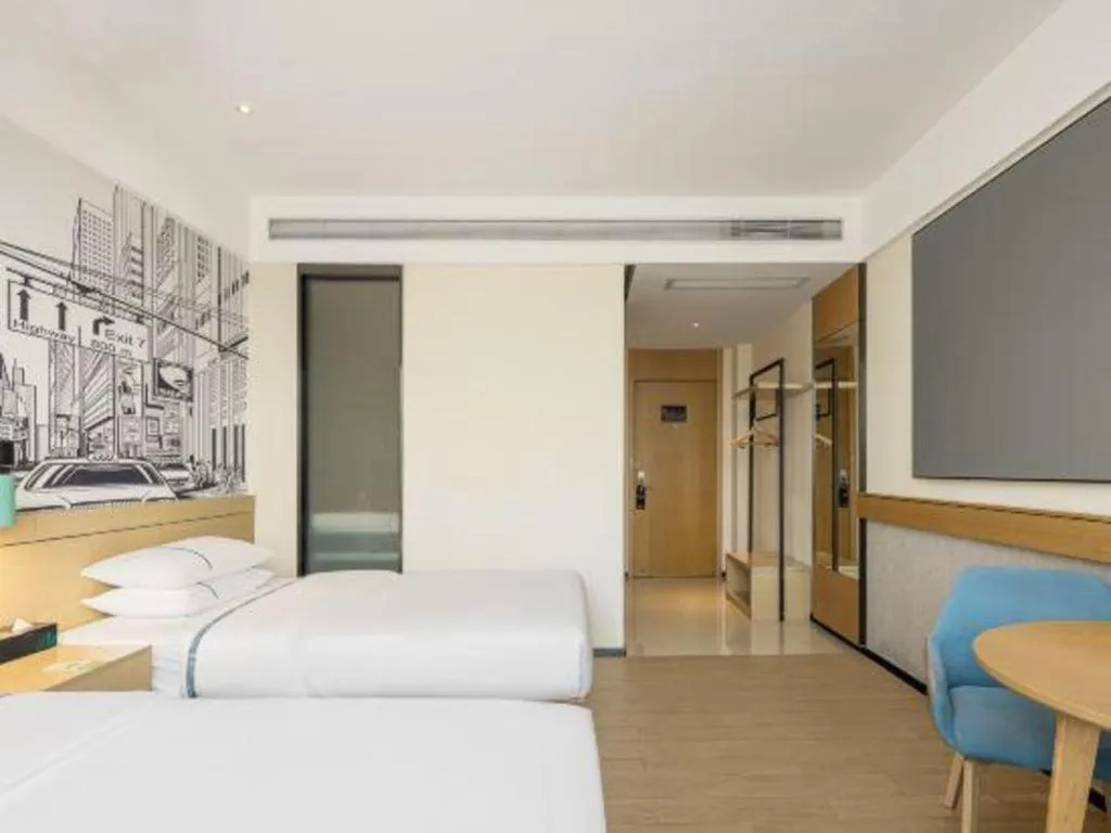 Bed in City Comfort Inn Shaoguan High-speed Railway Station Guanshaoyuan