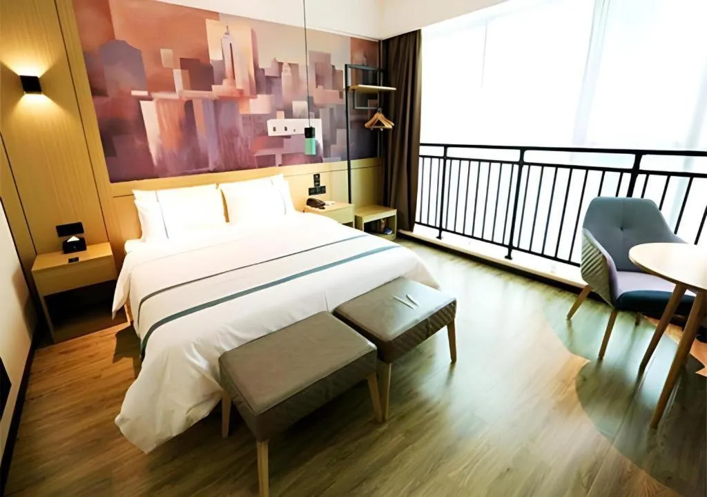 Bed in City Comfort Inn Shaoguan High-speed Railway Station Guanshaoyuan