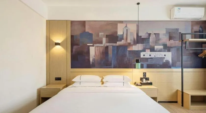 Bed in City Comfort Inn Shaoguan High-speed Railway Station Guanshaoyuan