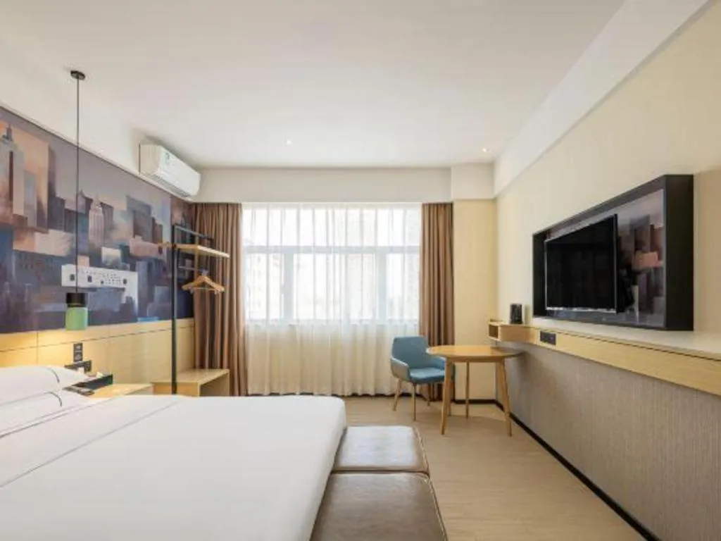 Bed in City Comfort Inn Shaoguan High-speed Railway Station Guanshaoyuan