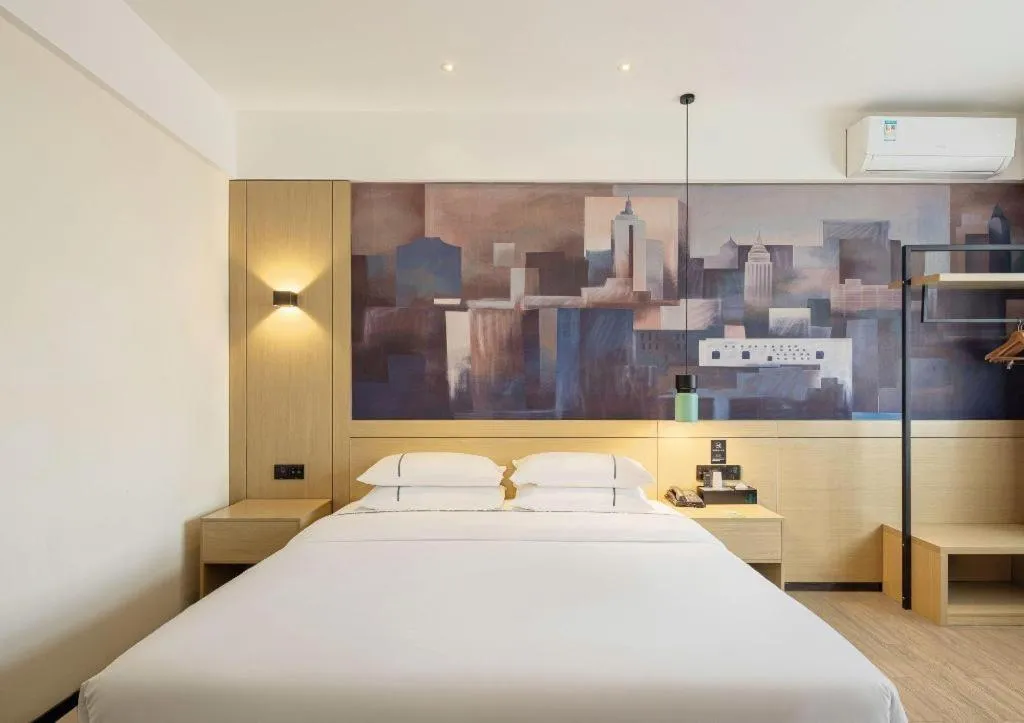 Bed in City Comfort Inn Shaoguan High-speed Railway Station Guanshaoyuan