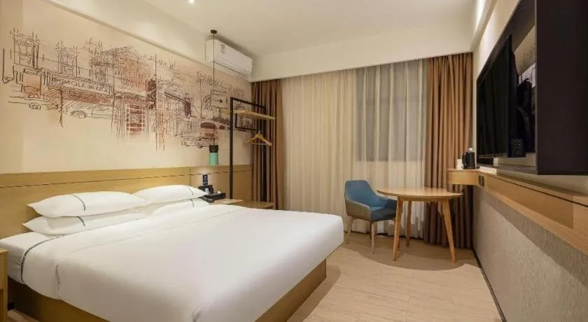 Bed in City Comfort Inn Shaoguan High-speed Railway Station Guanshaoyuan