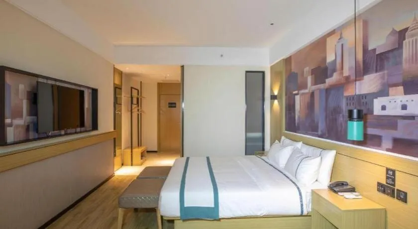 Bed in City Comfort Inn Shaoguan High-speed Railway Station Guanshaoyuan