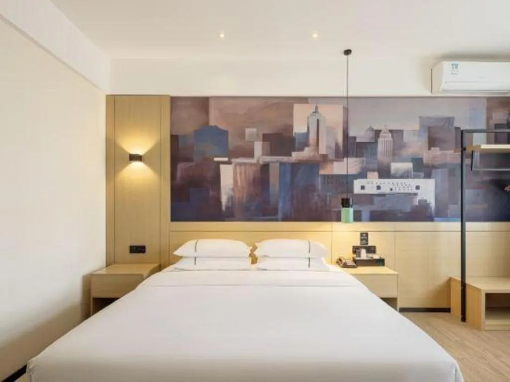 Bed in City Comfort Inn Shaoguan High-speed Railway Station Guanshaoyuan