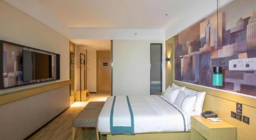 Bed in City Comfort Inn Shaoguan High-speed Railway Station Guanshaoyuan