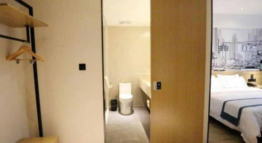 Bed in City Comfort Inn Shaoguan High-speed Railway Station Guanshaoyuan