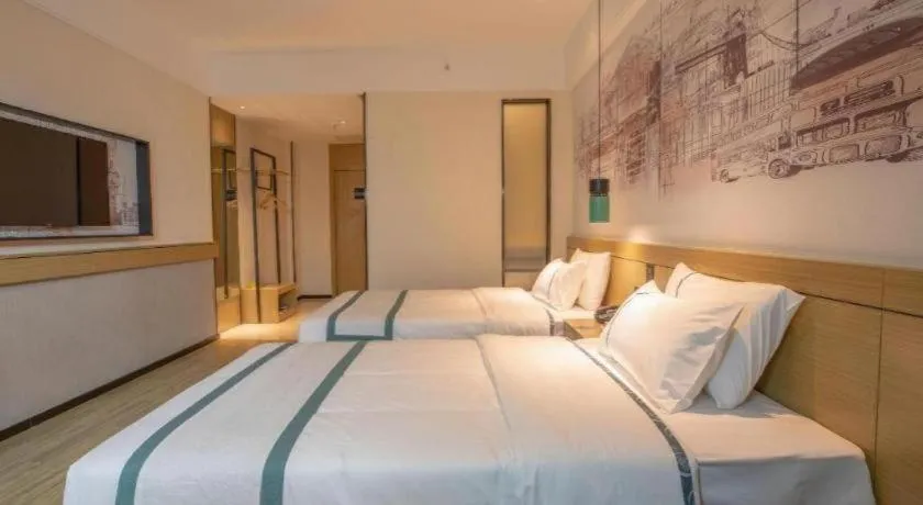 Bed in City Comfort Inn Shaoguan High-speed Railway Station Guanshaoyuan