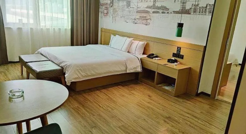 Bed in City Comfort Inn Shaoguan High-speed Railway Station Guanshaoyuan