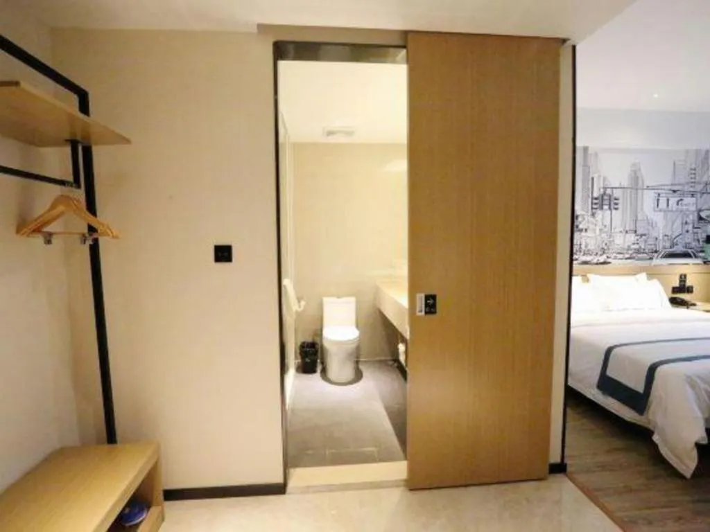 Bed in City Comfort Inn Shaoguan High-speed Railway Station Guanshaoyuan