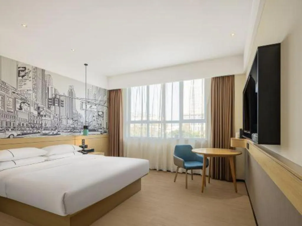 Bed in City Comfort Inn Shaoguan High-speed Railway Station Guanshaoyuan