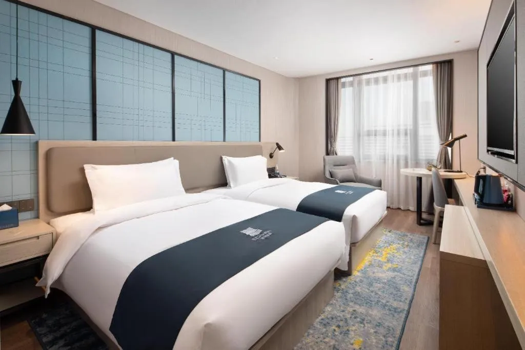 Bed in Echarm Hotel Shenyang Zhongjie North Station Metro Station