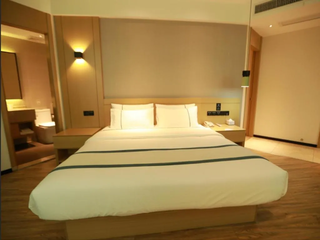Bed in City Comfort Inn Qingyuan City Plaza Hefu Dongcheng