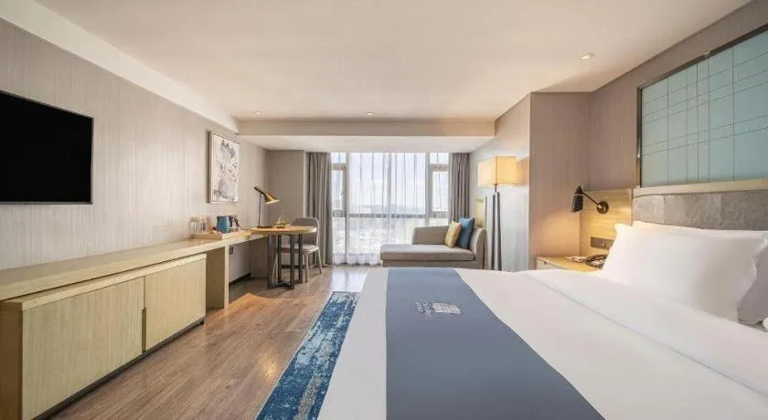 Bed in Echarm Hotel Guiyang North High-speed Railway Station