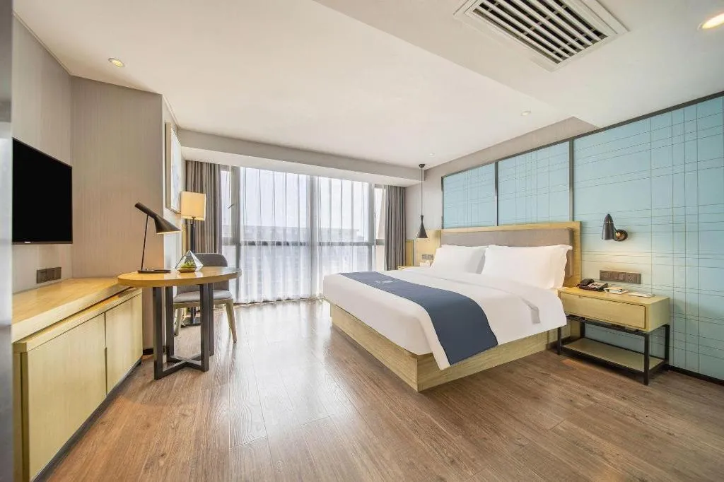 Bed in Echarm Hotel Guiyang North High-speed Railway Station
