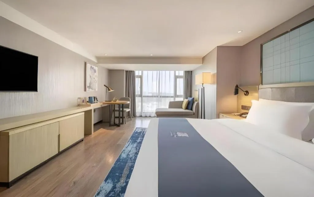 Bed in Echarm Hotel Guiyang North High-speed Railway Station