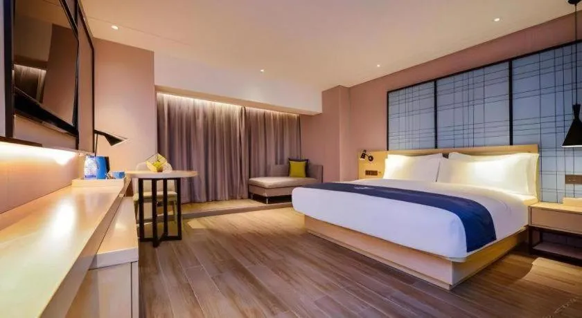 Bed in Echarm Hotel Guiyang North High-speed Railway Station