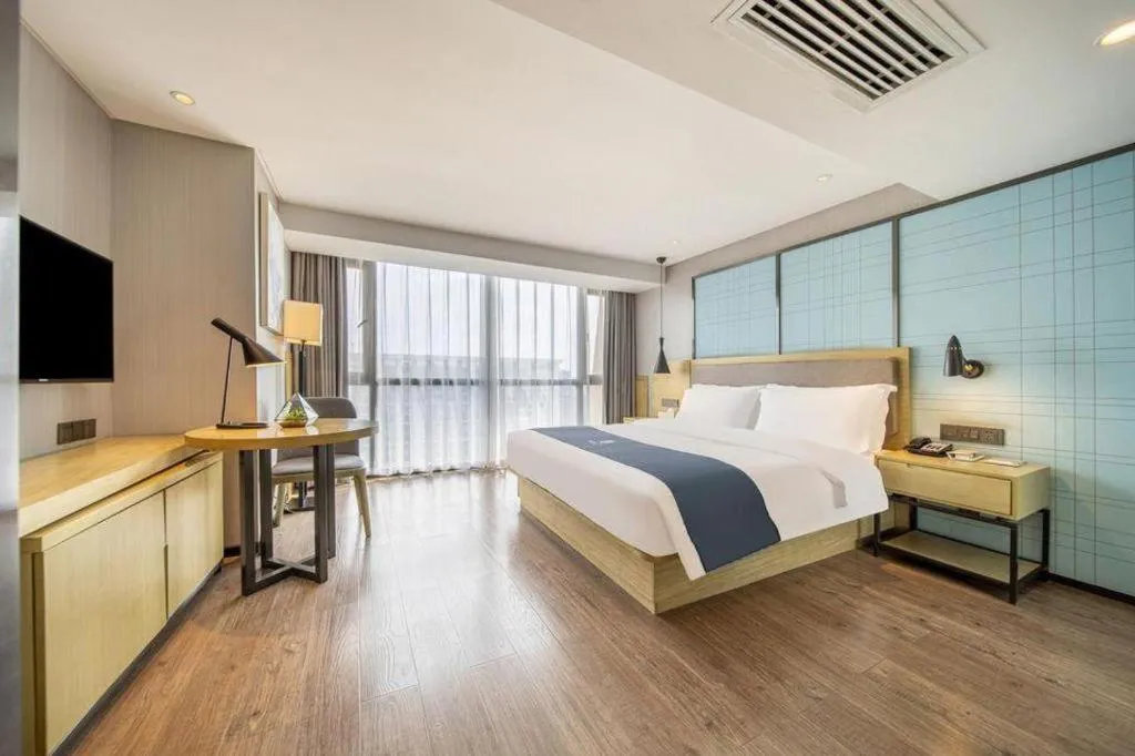Bed in Echarm Hotel Guiyang North High-speed Railway Station