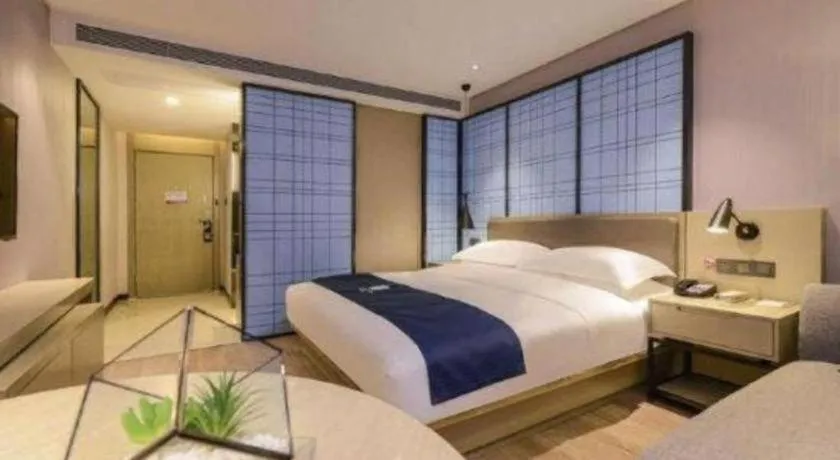 Bed in Echarm Hotel Guiyang North High-speed Railway Station