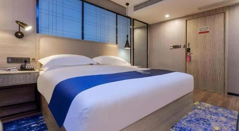 Bed in Echarm Hotel Guiyang North High-speed Railway Station